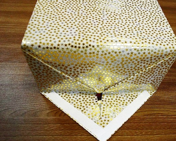 Как упаковать подарок в подарочную бумагу